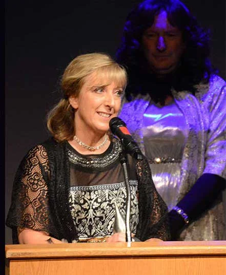 Michelle McCue, Award Winner (Bob McCue in background)