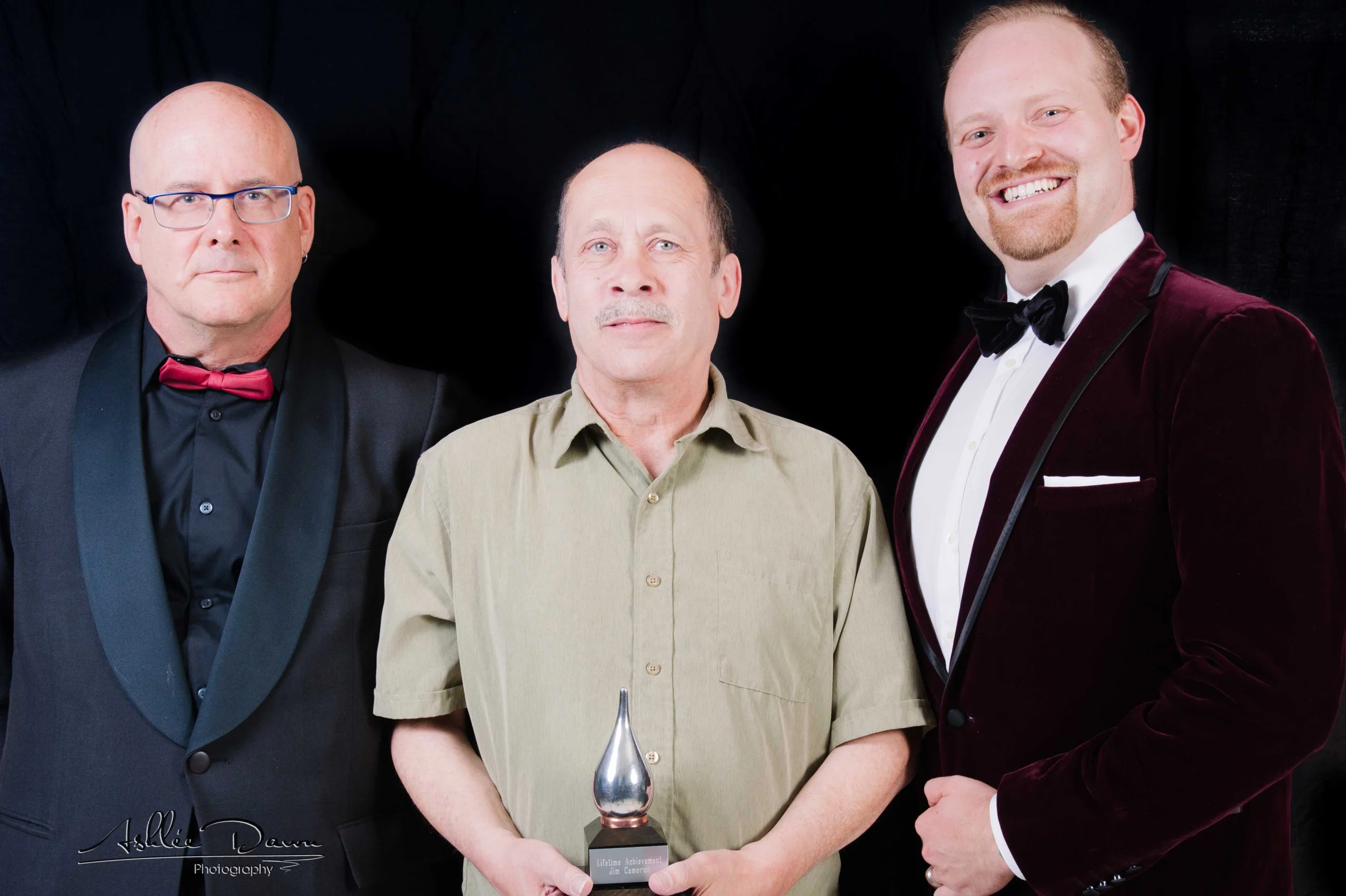 Jim with his Buddy Award and presenters