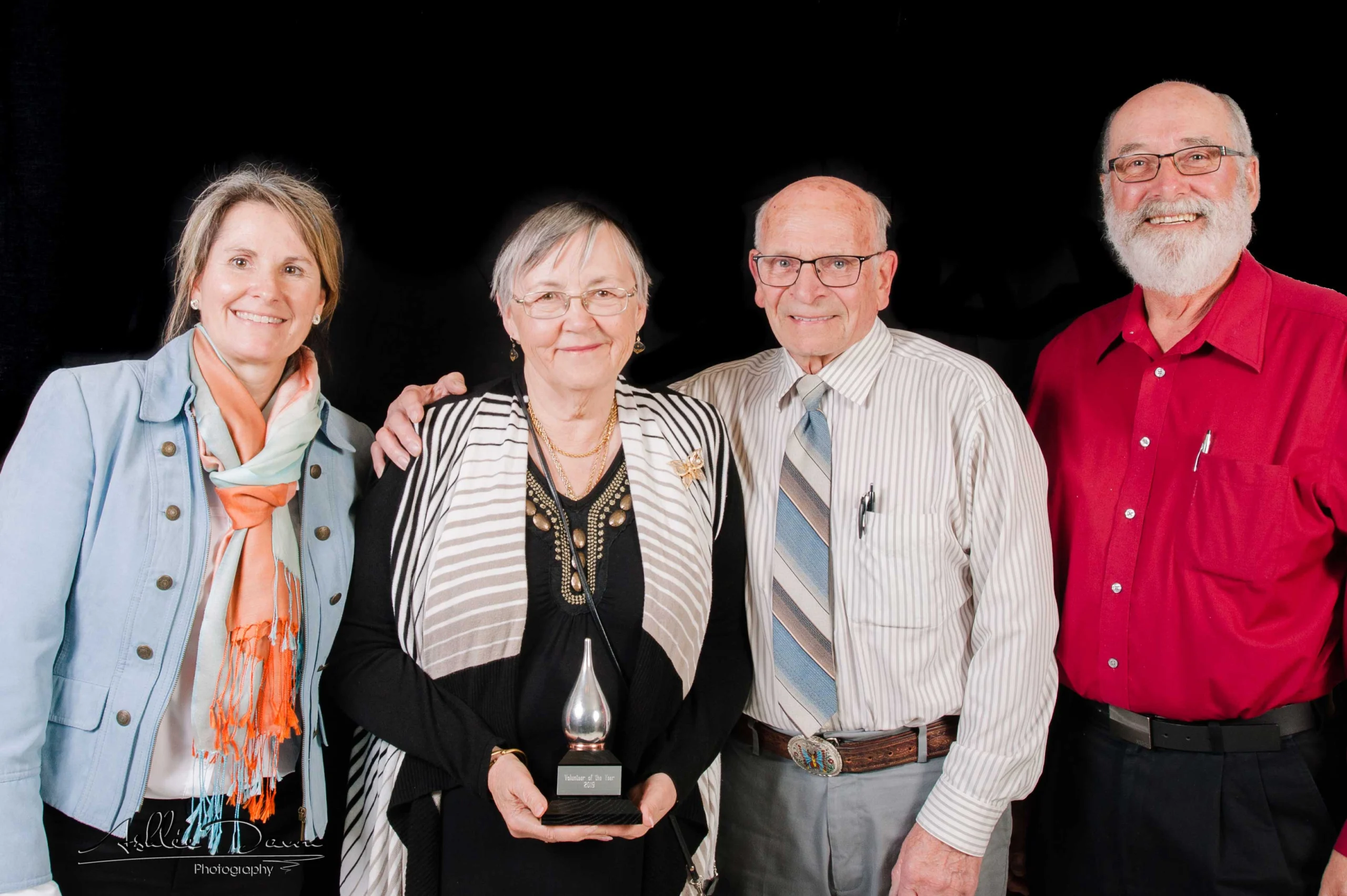 Jean-Ann and Joe with their Buddy Award and presenters