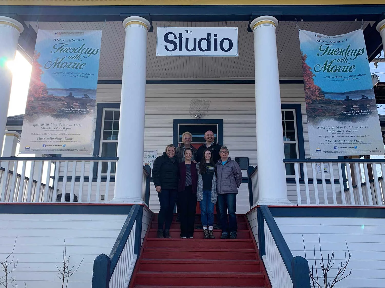 Hanging the show banner at the Studio Stage Door April 2022