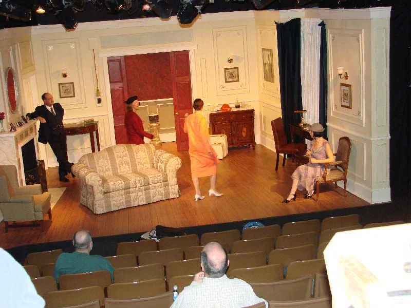Cast on stage, Producer & Director watching